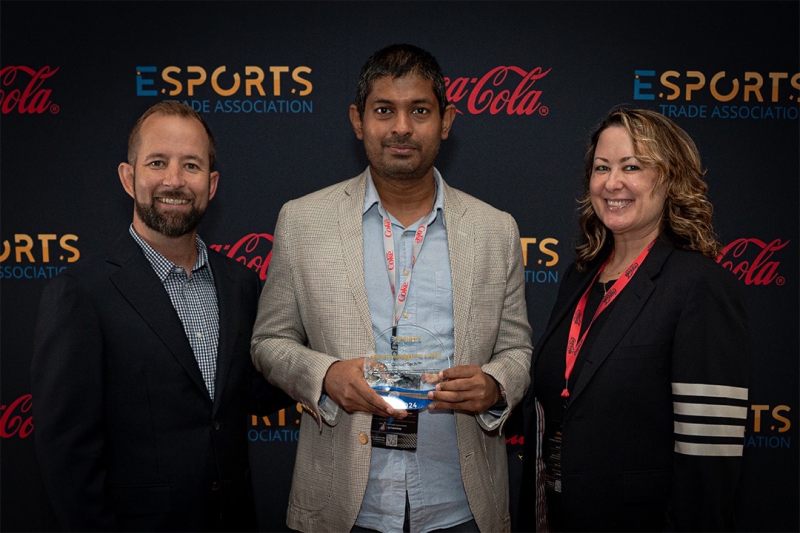Tharaka receiving the Esports Innovation Award for the world's first performance gaming glove, Boston USA